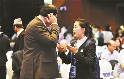 盛會大美亞細亞，崗位服務志愿情——記圖文設計制作中的奉獻之光